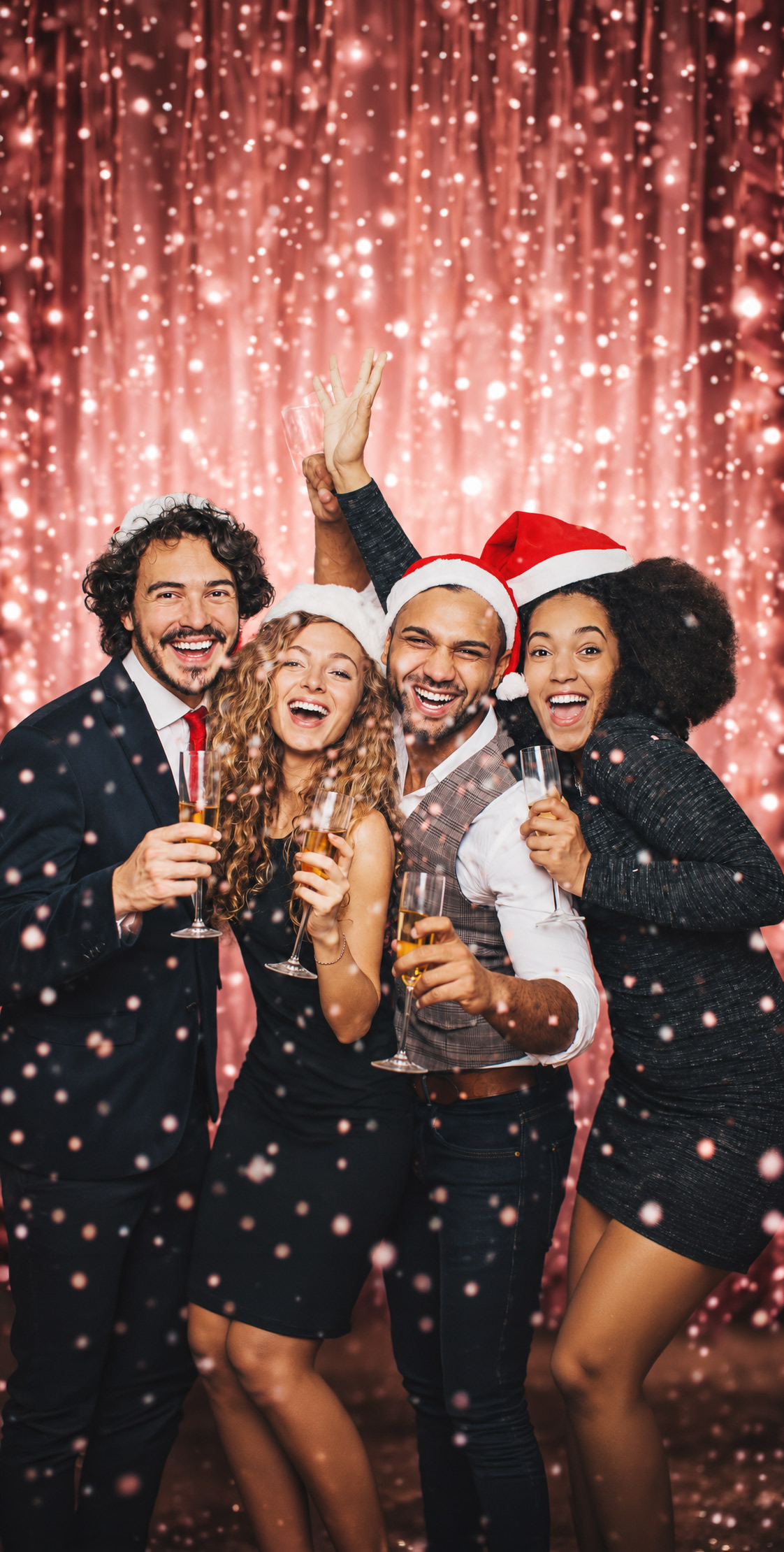 group of friends with christmas hats